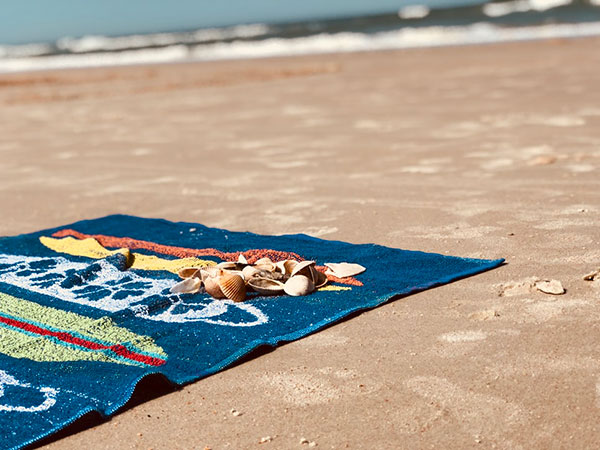 Toalha para piscina e suas diferenças com a toalha de banho